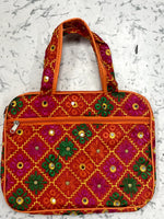 MulticolorRed Phulkari Paded laptop bag with mirror work with both side handles and extra zip pocket for chargers. - The Amritsar Store
