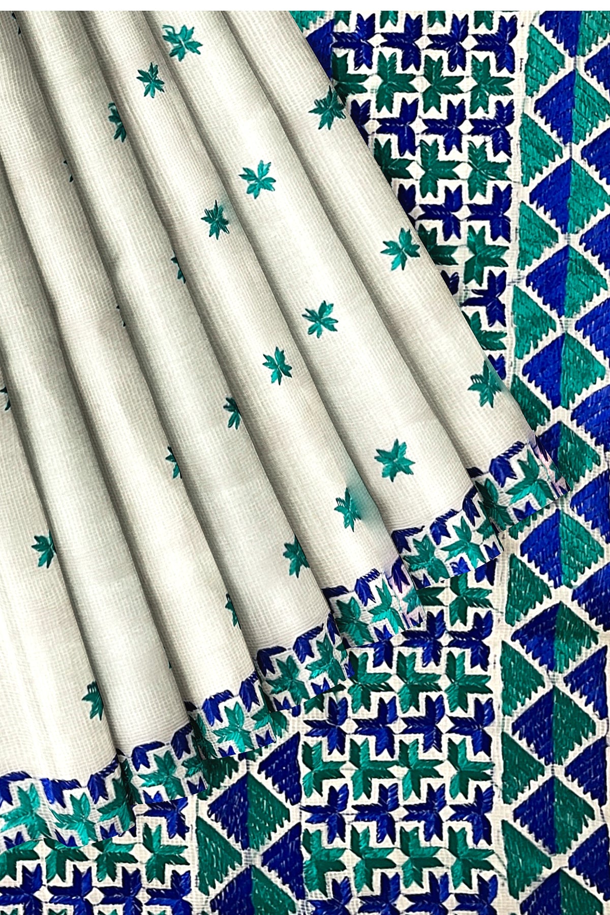 The Amritsar Store Phulkari Saree – Hand Embroidered White Fabric with Elegant Blue Accent