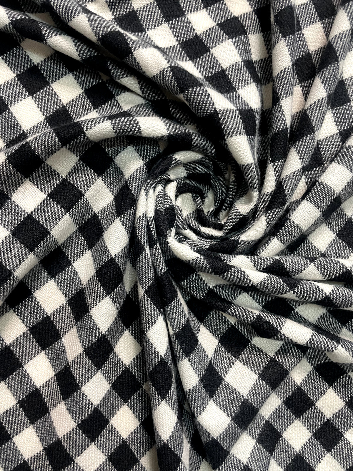 The Amritsar Store black and white check wool scarf with classic plaid pattern and soft winter weave