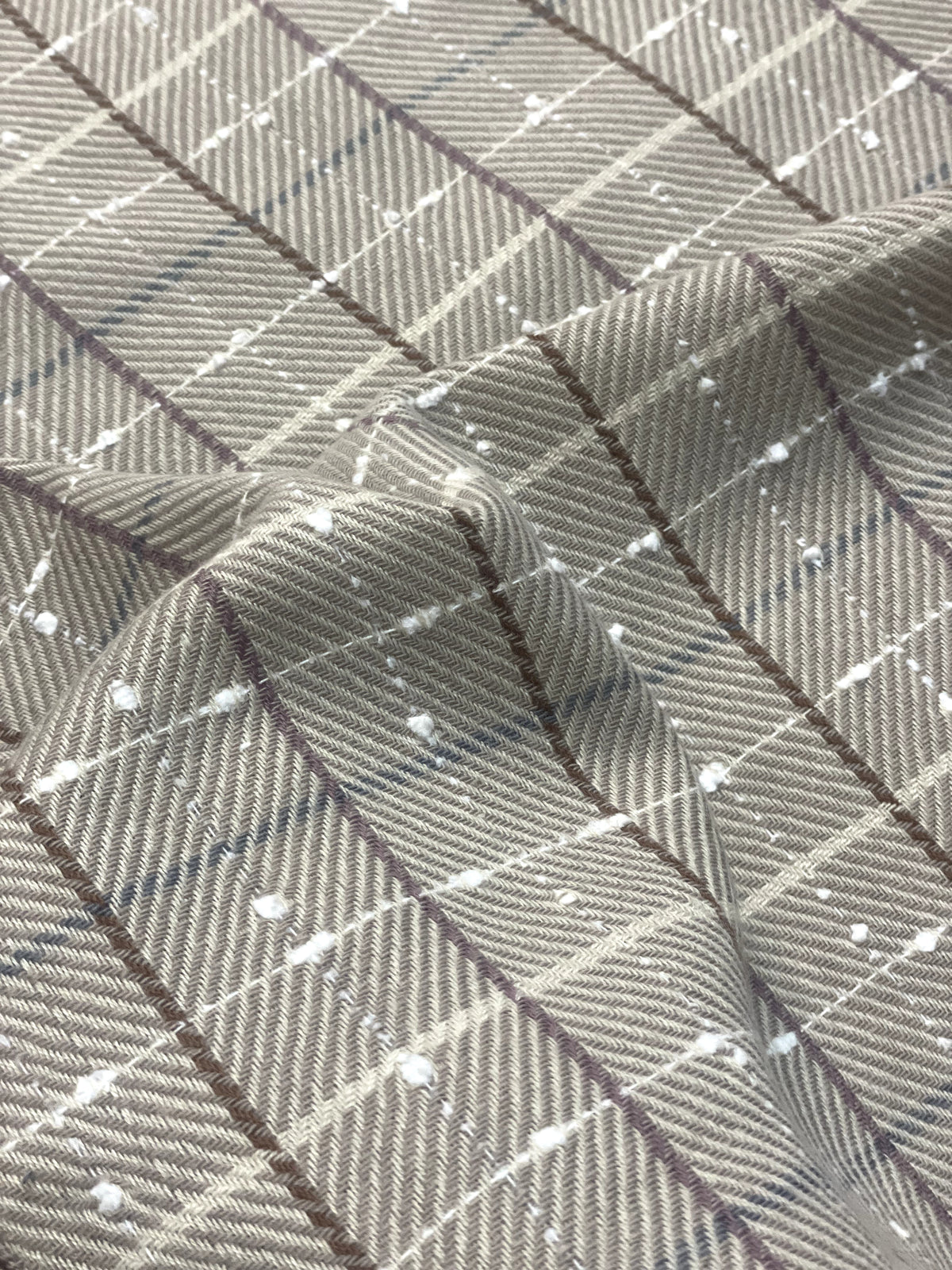 The Amritsar Store classic beige and white check wool scarf with a soft woven texture, elegant neutral checks, and a timeless winter design