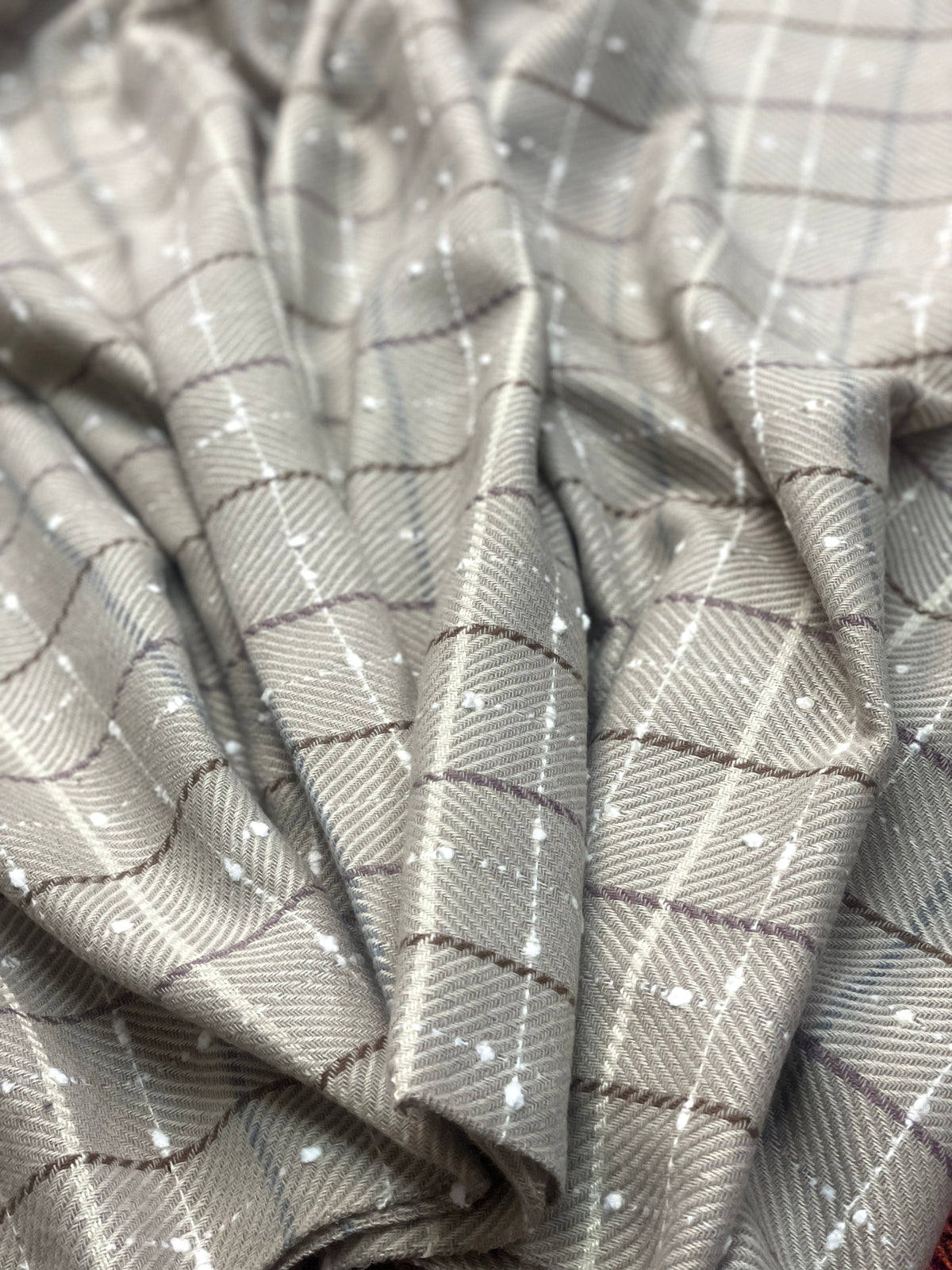 The Amritsar Store classic beige and white check wool scarf with a soft woven texture, elegant neutral checks, and a timeless winter design