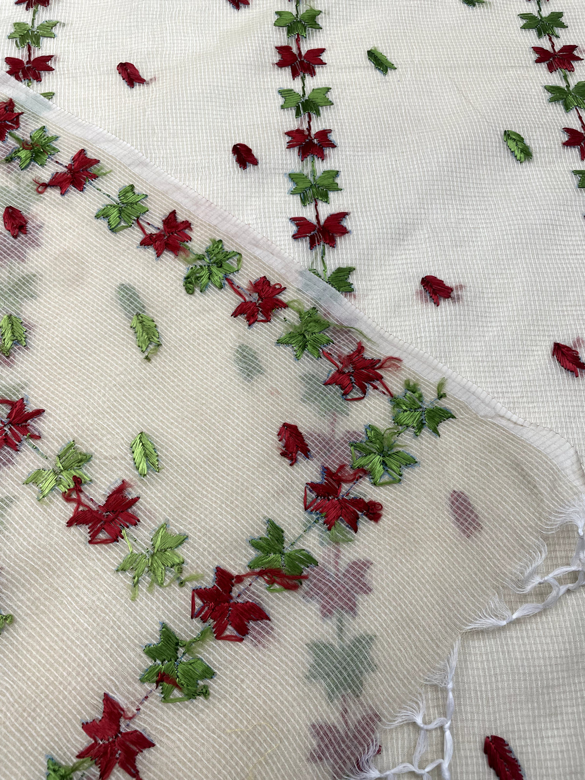 Hand embroidered off white Kota Doria phulkari dupatta for women featuring delicate floral embroidery, lightweight ethnic wrap for traditional and festive wear.