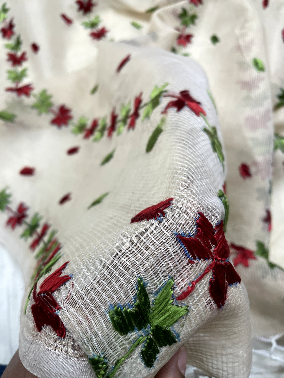 Hand embroidered off white Kota Doria phulkari dupatta for women featuring delicate floral embroidery, lightweight ethnic wrap for traditional and festive wear.