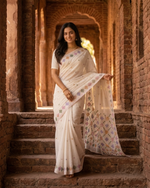 Hand embroidered off white Phulkari saree for women featuring traditional Punjabi embroidery and artisanal craftsmanship