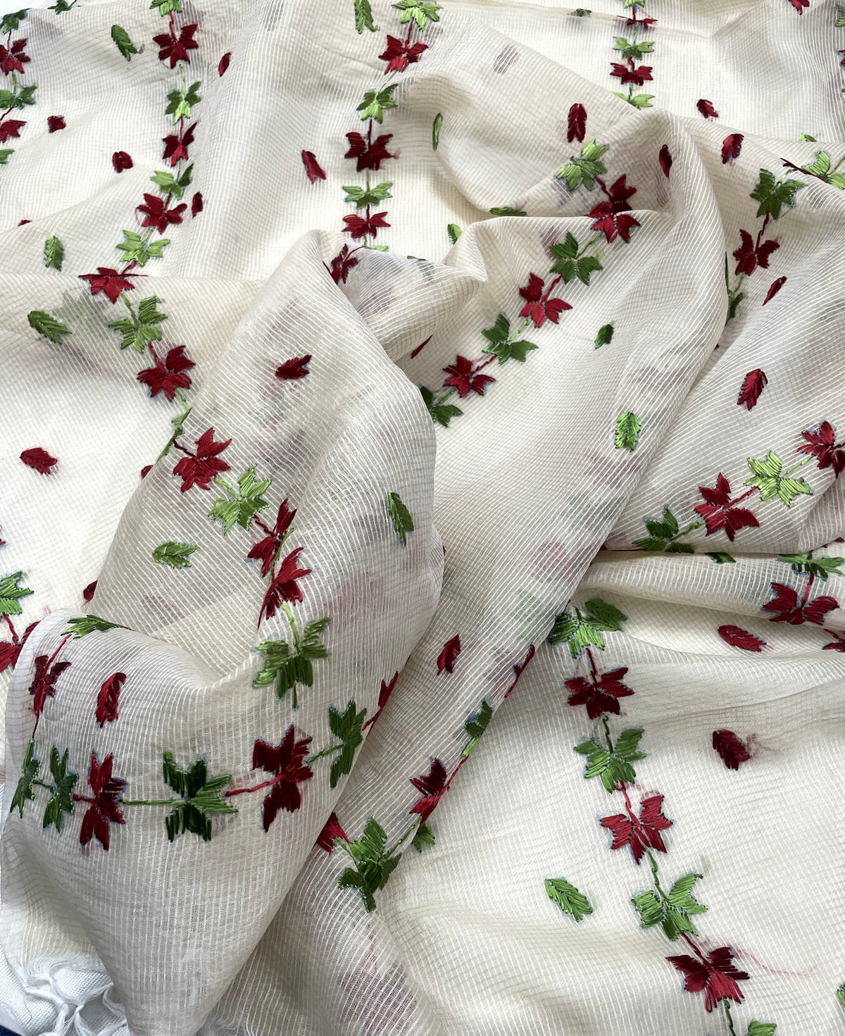 Hand embroidered off white Kota Doria phulkari dupatta for women featuring delicate floral embroidery, lightweight ethnic wrap for traditional and festive wear.