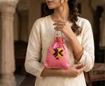 Traditional Punjabi pink potli bag with golden lace and detailed embroidery