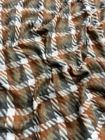 The Amritsar Store rust and olive classic check scarf for women, featuring an elegant checked pattern and soft drape