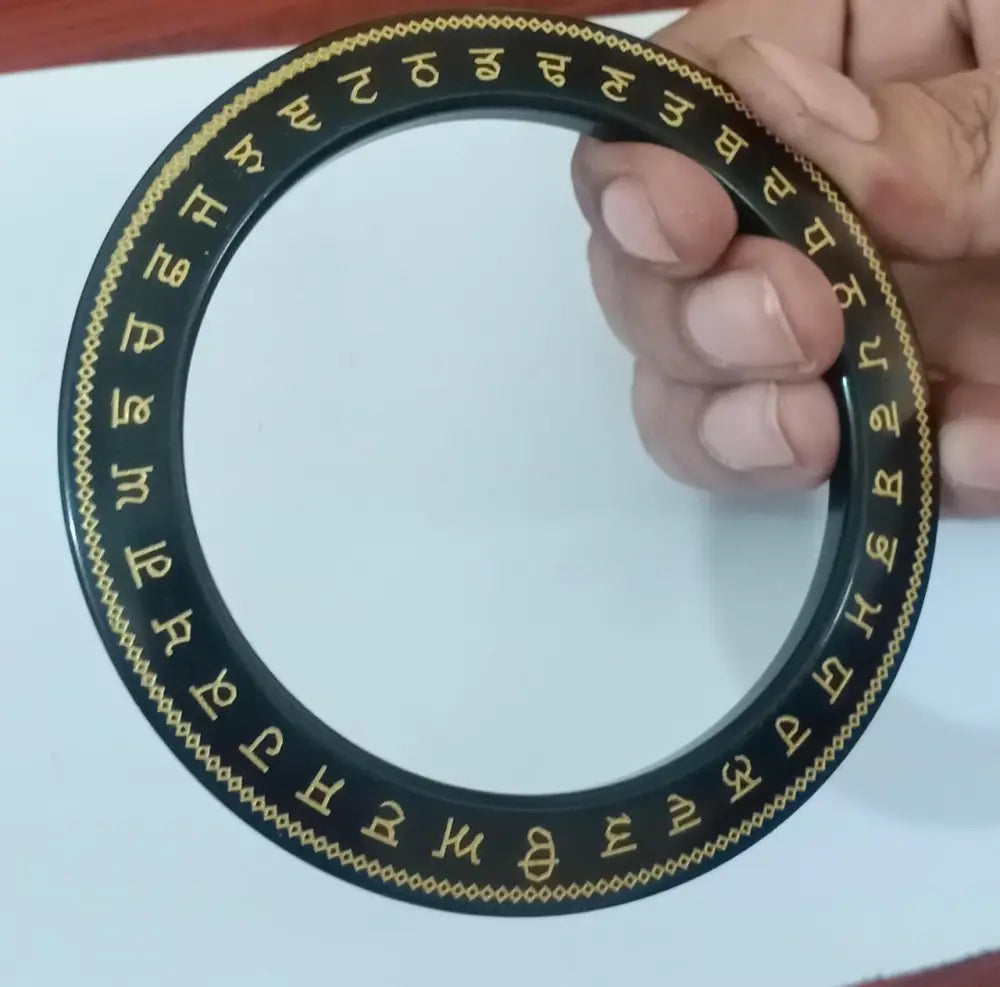 Sarbhloh metal Punjabi Kada with Gurmukhi wording and Khalsa symbol engraving by The Amritsar Store, traditional Sikh steel bangle for men