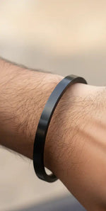 Black stainless steel plain kada bracelet with 0.2 inch thickness and smooth polished finish by The Amritsar Store