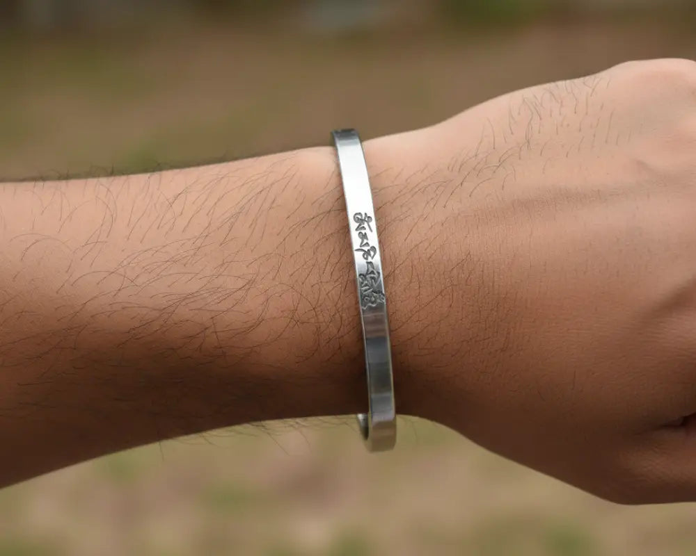 Stainless Steel 12mm Heavy Kada for Men featuring Lord Buddha image and Om Mani Padmehum mantra engraving by The Amritsar Store