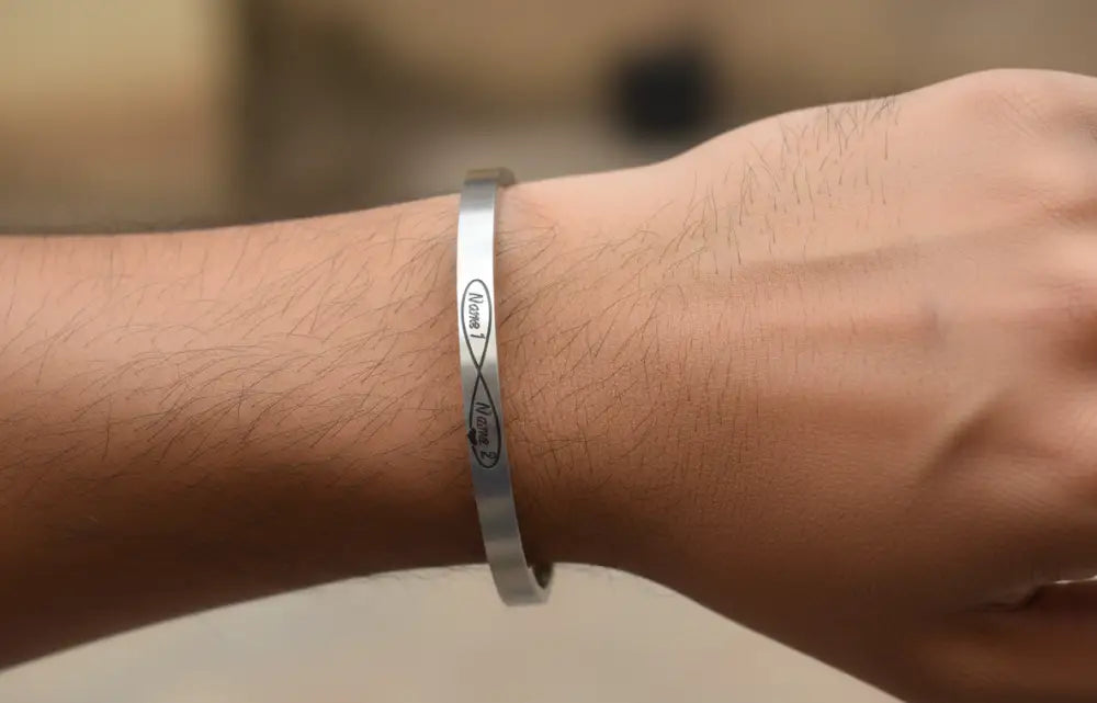Unisex stainless steel infinity symbol customised kada by The Amritsar Store, sleek polished finish bracelet suitable for daily wear and gifting
