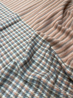 The Amritsar Store elegant reversible wool scarf featuring grey plaid design with soft pink woven accents