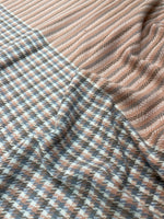 The Amritsar Store elegant reversible wool scarf featuring grey plaid design with soft pink woven accents