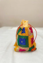 Traditional Punjabi multicolor Phulkari embroidered potli bag for women by The Amritsar Store.
