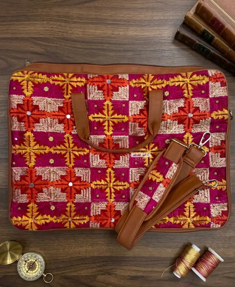 Multicolor Red Phulkari Padded Laptop Bag with Mirror Work and Dual Side Handles by The Amritsar Store