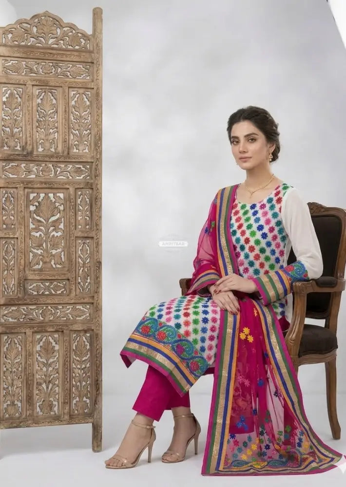 The Amritsar Store handcrafted Phulkari suit with vibrant traditional embroidery, unstitched Punjabi ethnic wear with dupatta for women