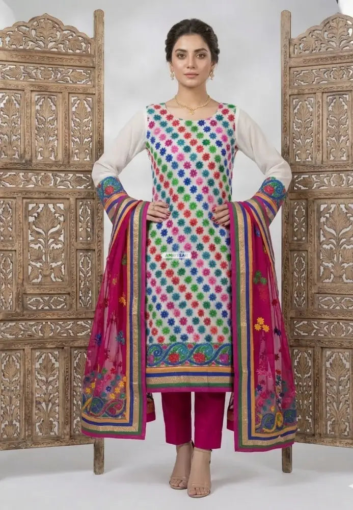 The Amritsar Store handcrafted Phulkari suit with vibrant traditional embroidery, unstitched Punjabi ethnic wear with dupatta for women