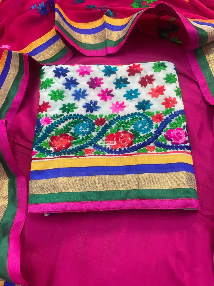 The Amritsar Store handcrafted Phulkari suit with vibrant traditional embroidery, unstitched Punjabi ethnic wear with dupatta for women