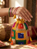 Traditional Punjabi multicolor Phulkari embroidered potli bag for women by The Amritsar Store.
