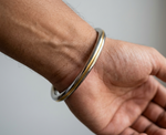 Steel and brass curved edges Sikh Punjabi Kada for men by The Amritsar Store, traditional Khalsa style bangle with polished finish for daily and religious wear.