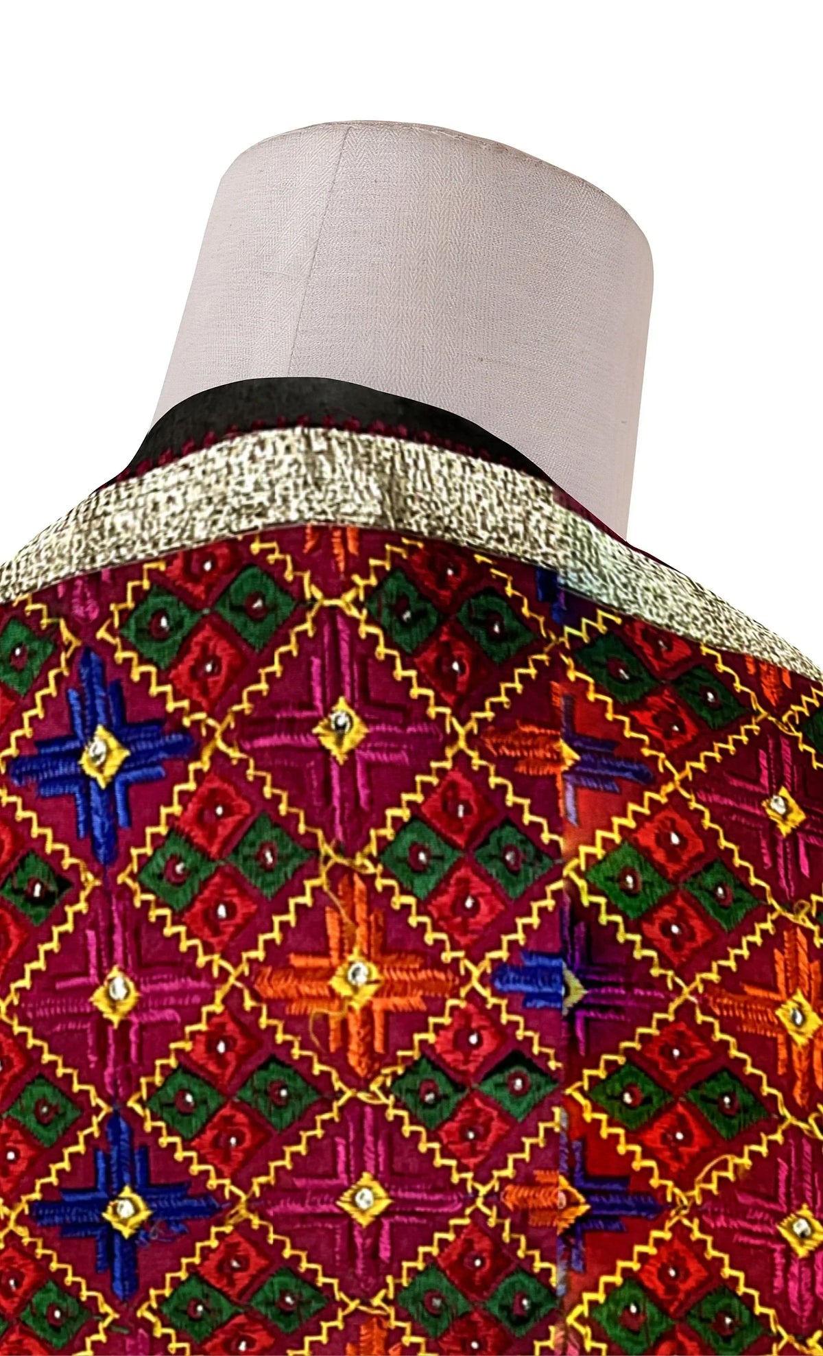 Rangoli Charm Phulkari reflects the vibrant magenta base and multicolor embroidery, reminiscent of a traditional rangoli design, full of color and cultural richness. - The Amritsar Store