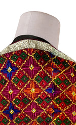 Rangoli Charm Phulkari reflects the vibrant magenta base and multicolor embroidery, reminiscent of a traditional rangoli design, full of color and cultural richness. - The Amritsar Store