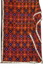 Rangoli Charm Phulkarireflects the vibrant magenta base and multicolor embroidery, reminiscent of a traditional rangoli design, full of color and cultural richness.