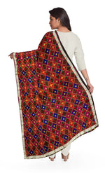 Rangoli Charm Phulkari reflects the vibrant magenta base and multicolor embroidery, reminiscent of a traditional rangoli design, full of color and cultural richness. - The Amritsar Store