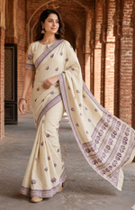 Hand embroidered off white Phulkari saree with colorful peacock motif and traditional Punjabi embroidery by The Amritsar Store