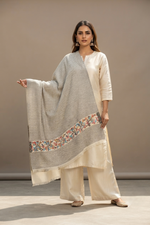 Women's traditional Kashmiri Kani shawl featuring heritage woven craftsmanship with elegant timeless detailing by The Amritsar Store.