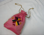Traditional Punjabi pink potli bag with golden lace and detailed embroidery