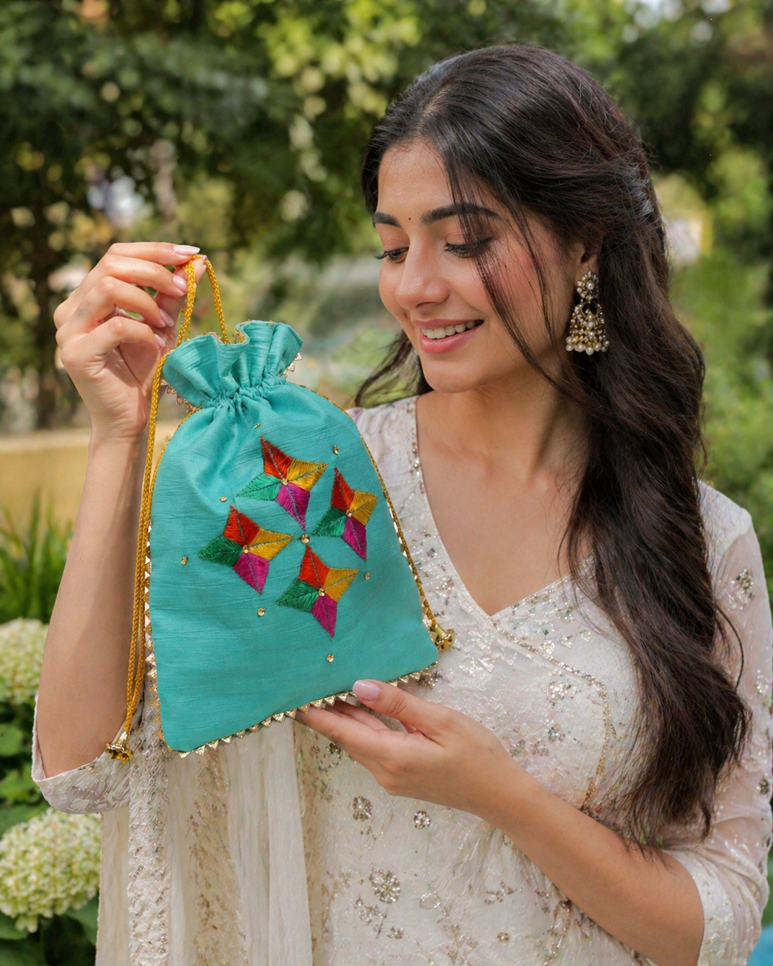 The Amritsar Store teal phulkari embroidered potli bag with golden lace, traditional Punjabi ethnic accessory for women