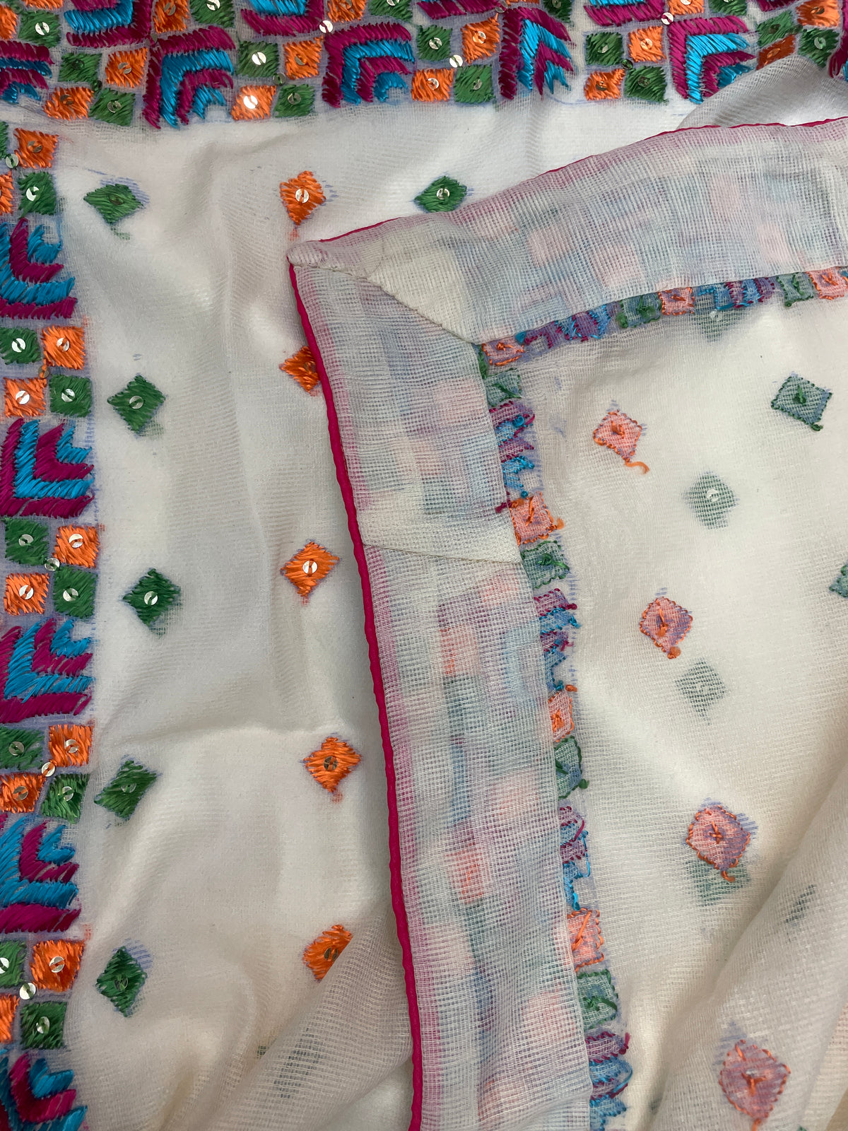 The Amritsar Store Phulkari Hand Embroidered Dupatta in cream color adorned with vibrant multicolor thread work, showcasing traditional Punjabi craftsmanship and elegance.