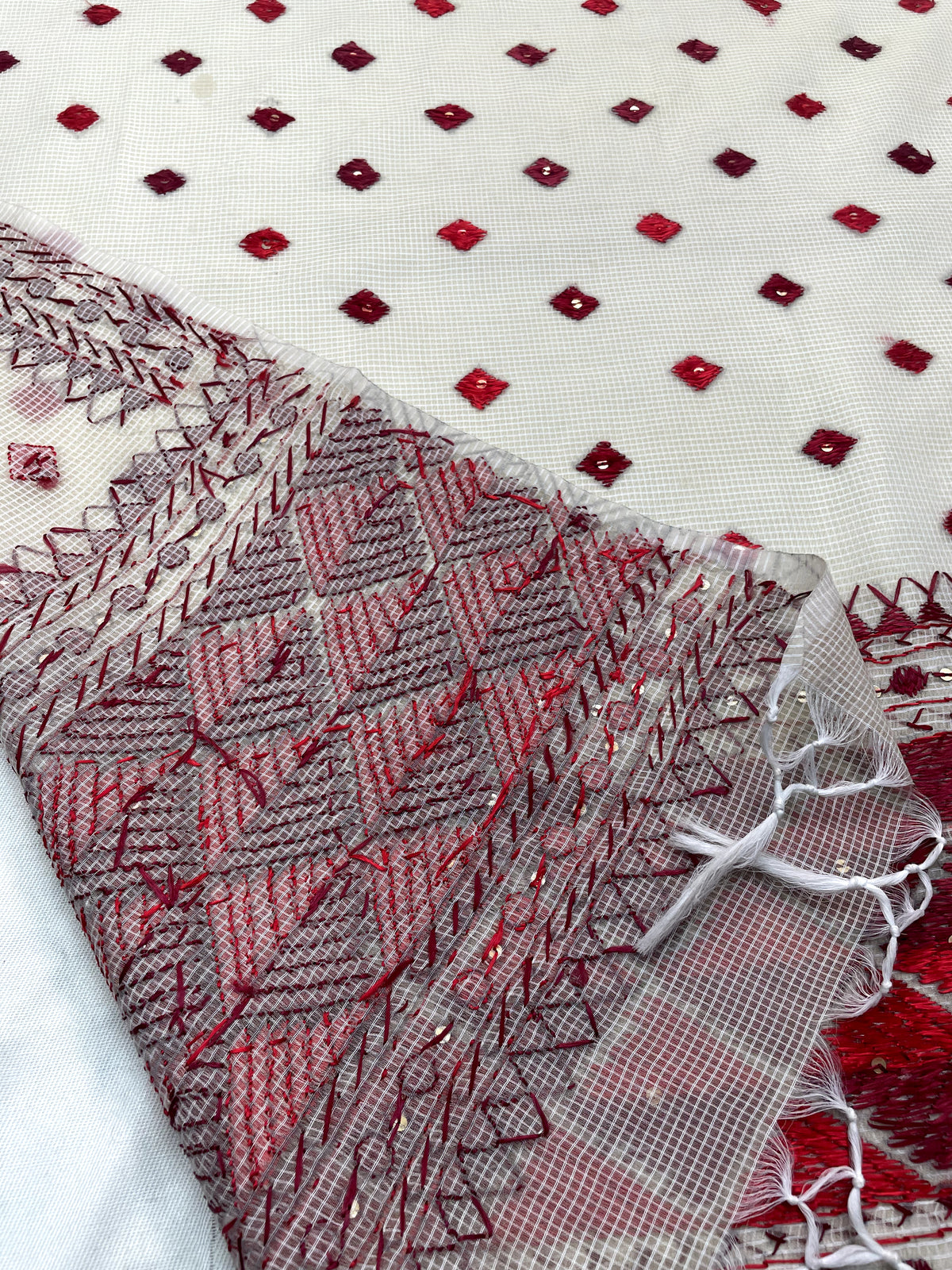 Hand embroidered off white Phulkari dupatta with red floral Punjabi embroidery by The Amritsar Store