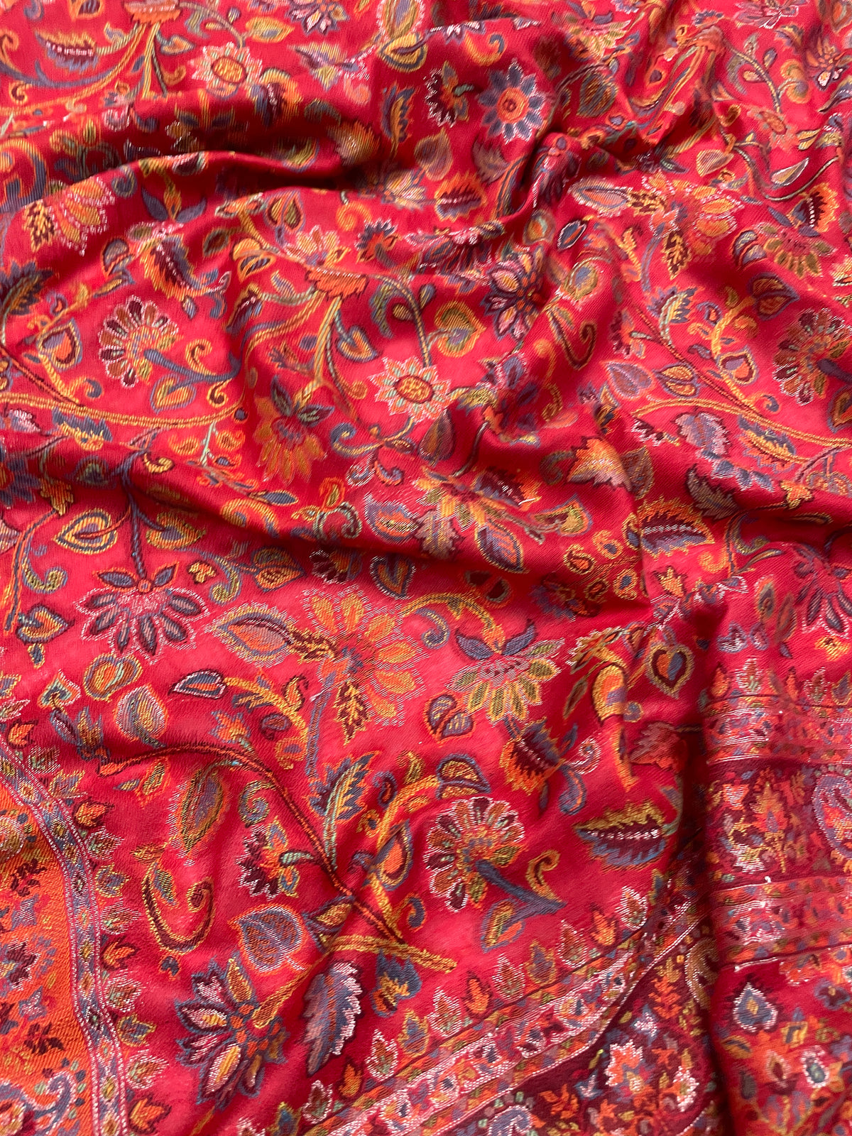 Majestic Peacock Garden Jaal shawl by The Amritsar Store featuring an intricate multicolor woven floral and peacock pattern.