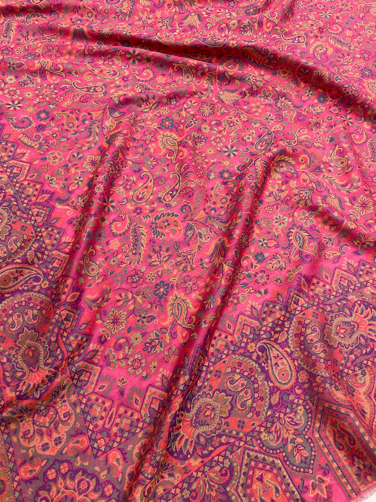Women's magenta Kashmiri Jaal shawl featuring multicolor paisley and floral weave with elegant traditional craftsmanship in a premium designer wrap.