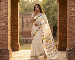 Hand embroidered off white Phulkari Bagh saree featuring traditional Punjabi geometric motifs and artisan craftsmanship.