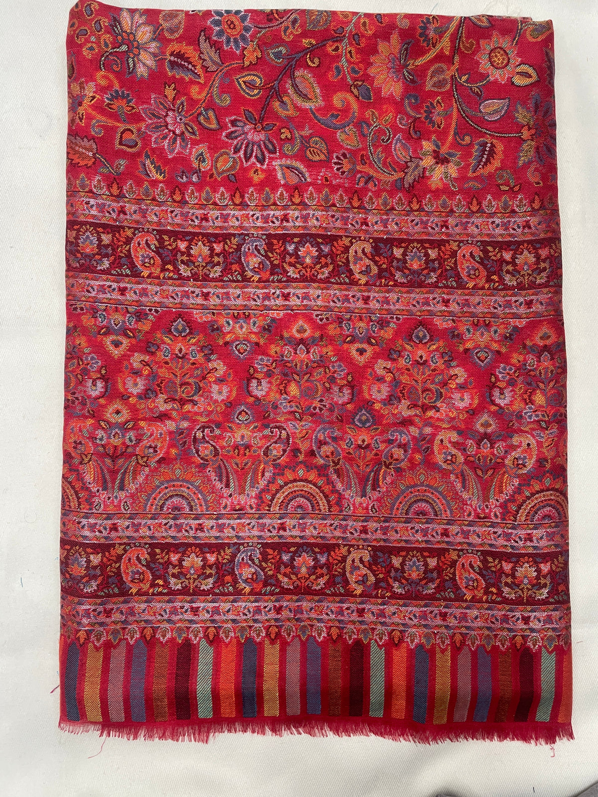 Majestic Peacock Garden Jaal shawl by The Amritsar Store featuring an intricate multicolor woven floral and peacock pattern.