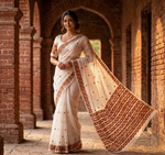 Hand embroidered off white Phulkari saree for women featuring traditional Punjabi embroidery and artisanal craftsmanship.