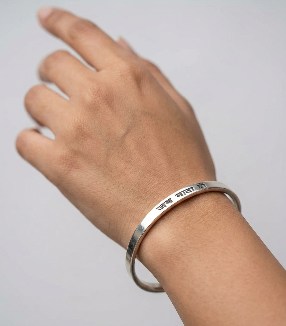 Punjabi men’s stainless steel Kada laser marked with “Jai Mata Di” devotional engraving by The Amritsar Store, polished religious Sikh bangle for daily wear