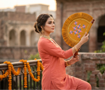 Handcrafted Phulkari hand fan pankhi with vibrant red base and multicolor floral embroidery by The Amritsar Store, showcasing traditional Punjabi artistry