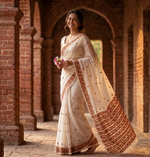 Hand embroidered off white Phulkari saree for women featuring traditional Punjabi embroidery and artisanal craftsmanship.