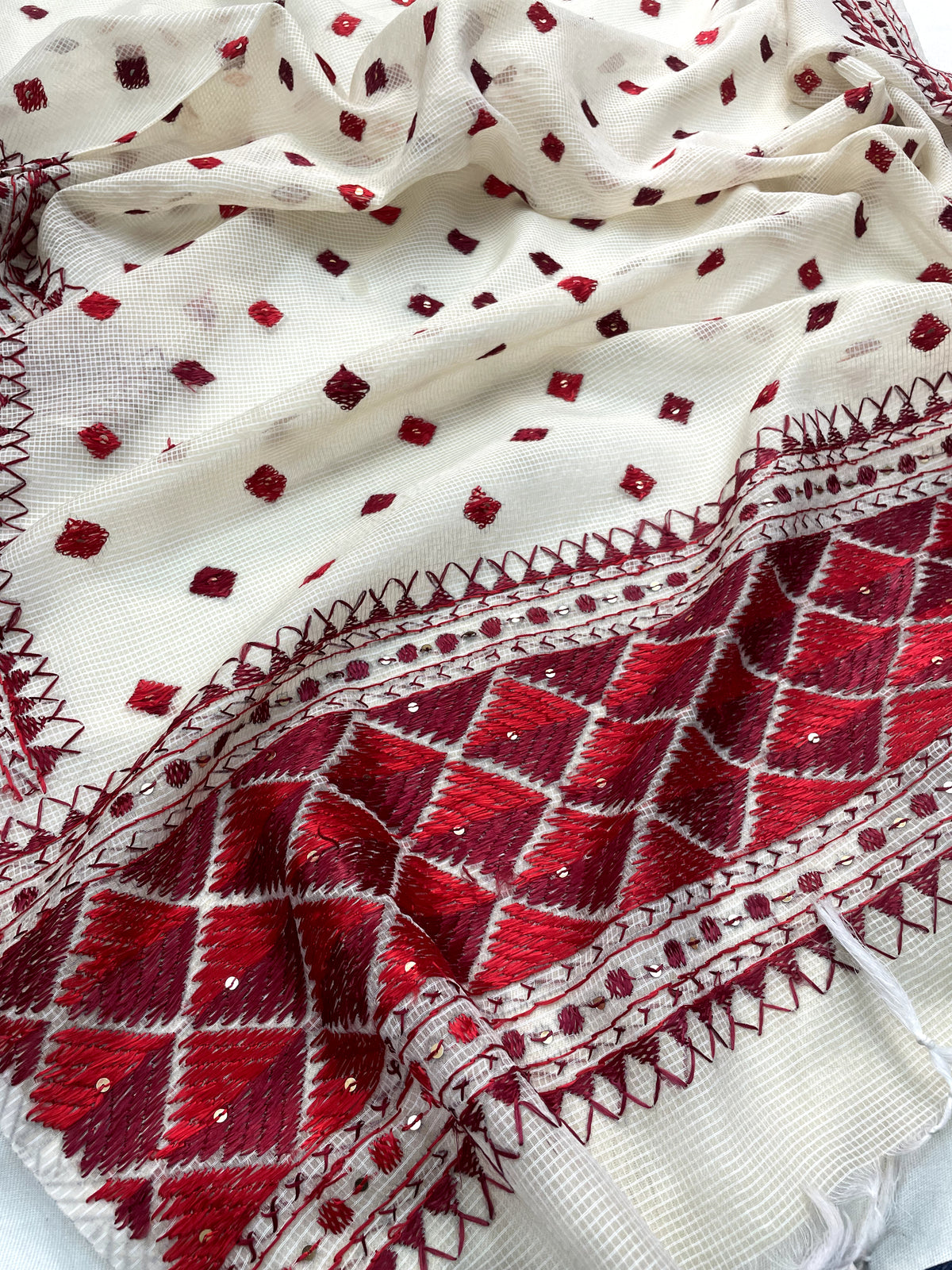 Hand embroidered off white Phulkari dupatta with red floral Punjabi embroidery by The Amritsar Store