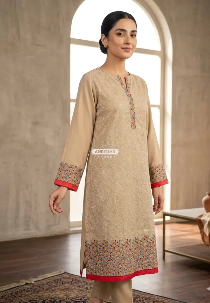 The Amritsar Store georgette kurti featuring elegant red and blue floral borders, lightweight ethnic wear for women, perfect for festive and casual occasions