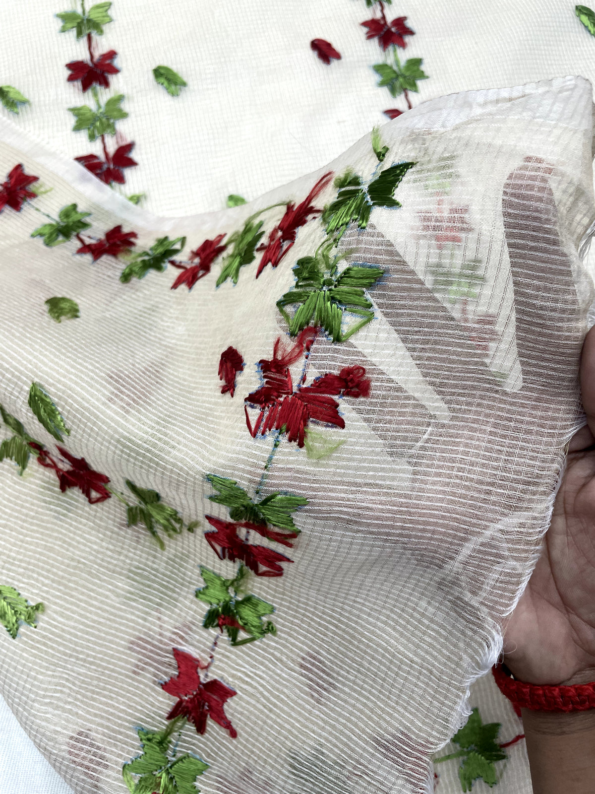 Hand embroidered off white Kota Doria phulkari dupatta for women featuring delicate floral embroidery, lightweight ethnic wrap for traditional and festive wear.