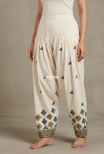 Off-white kora cotton salwar with traditional folk embroidery, lightweight breathable fabric, elegant Punjabi ethnic wear by The Amritsar Store