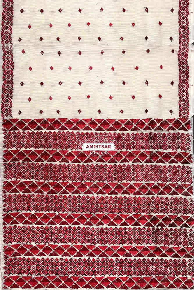 The Amritsar Store Phulkari Saree – Hand Embroidered Off-White Fabric with Red and Maroon Accents