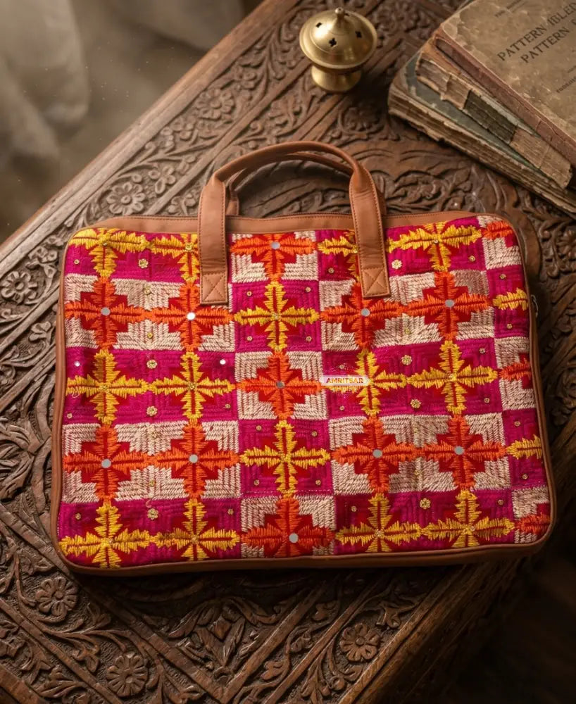 Multicolor Red Phulkari Padded Laptop Bag with Mirror Work and Dual Side Handles by The Amritsar Store