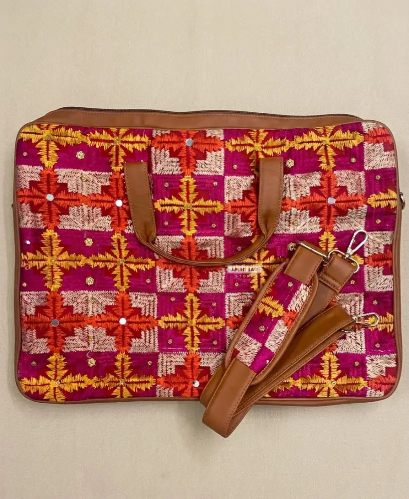 Multicolor Red Phulkari Padded Laptop Bag with Mirror Work and Dual Side Handles by The Amritsar Store