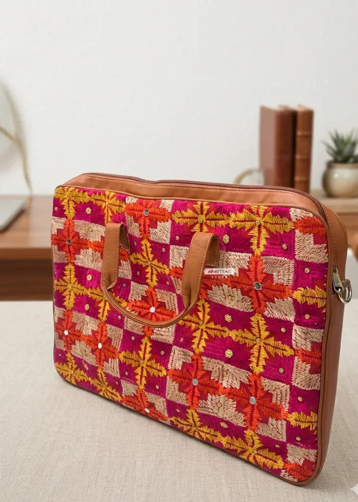 Multicolor Red Phulkari Padded Laptop Bag with Mirror Work and Dual Side Handles by The Amritsar Store